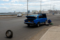 Change of tires, Malecón, Havana.